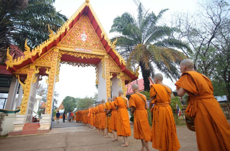 Thailands Temples with Buddhist Monks Going to Prayer